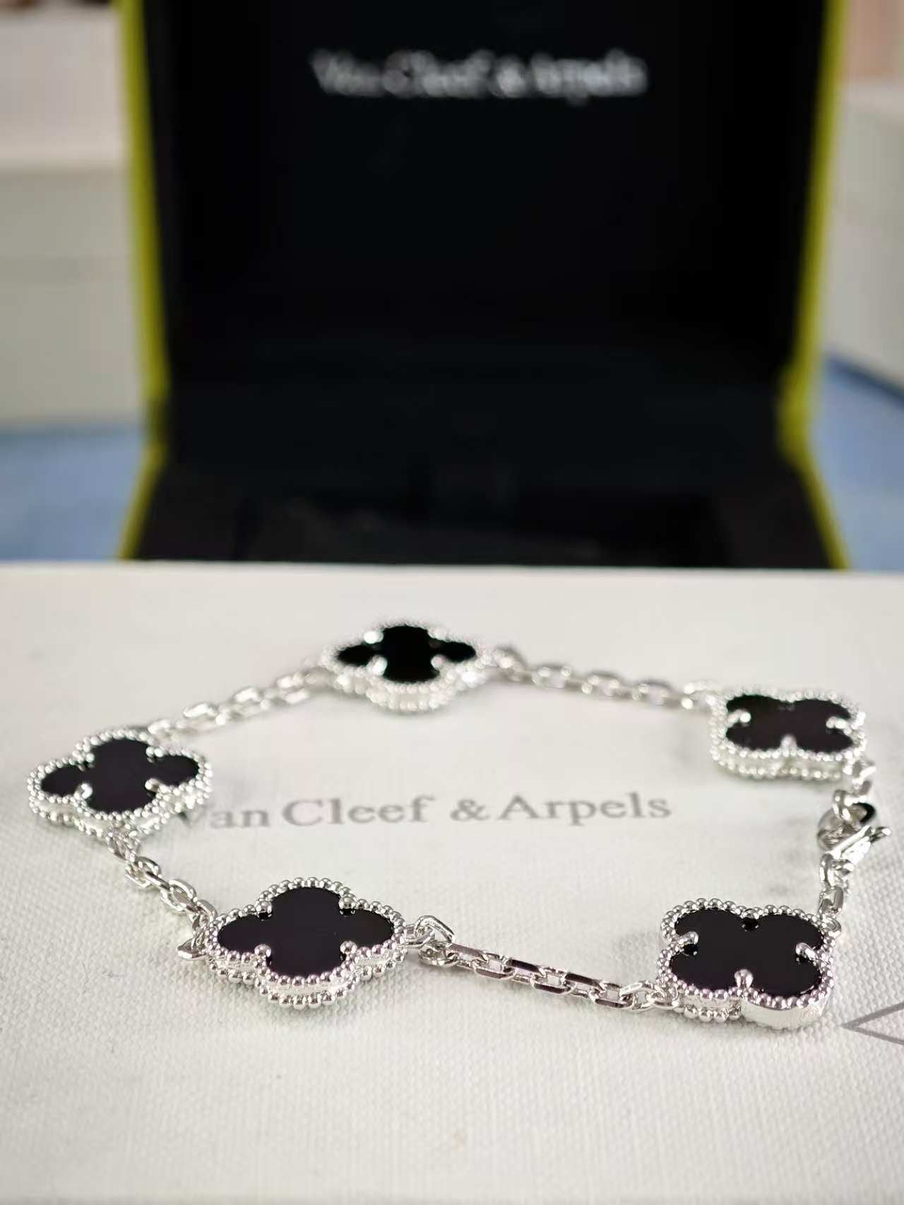 Four Leaf Clover Five Black Flowers White Bracelet