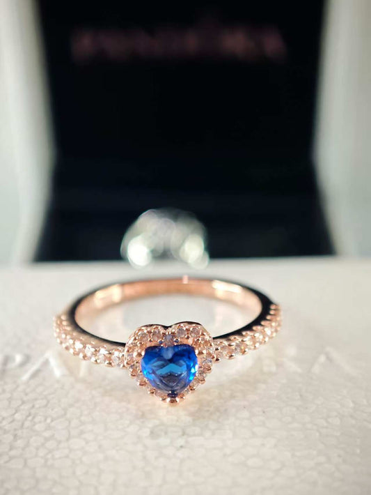 Rose Sparkling Blue Elevated Heart Ring