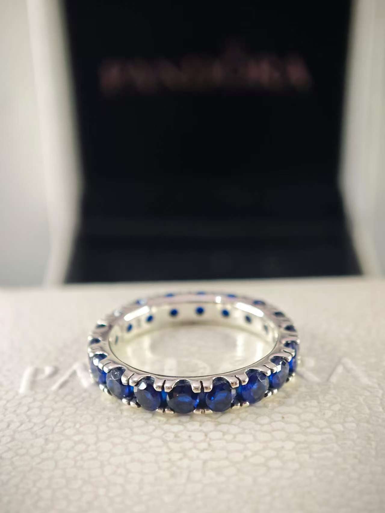 Sparkling Row Eternity Ring with Blue Crystal