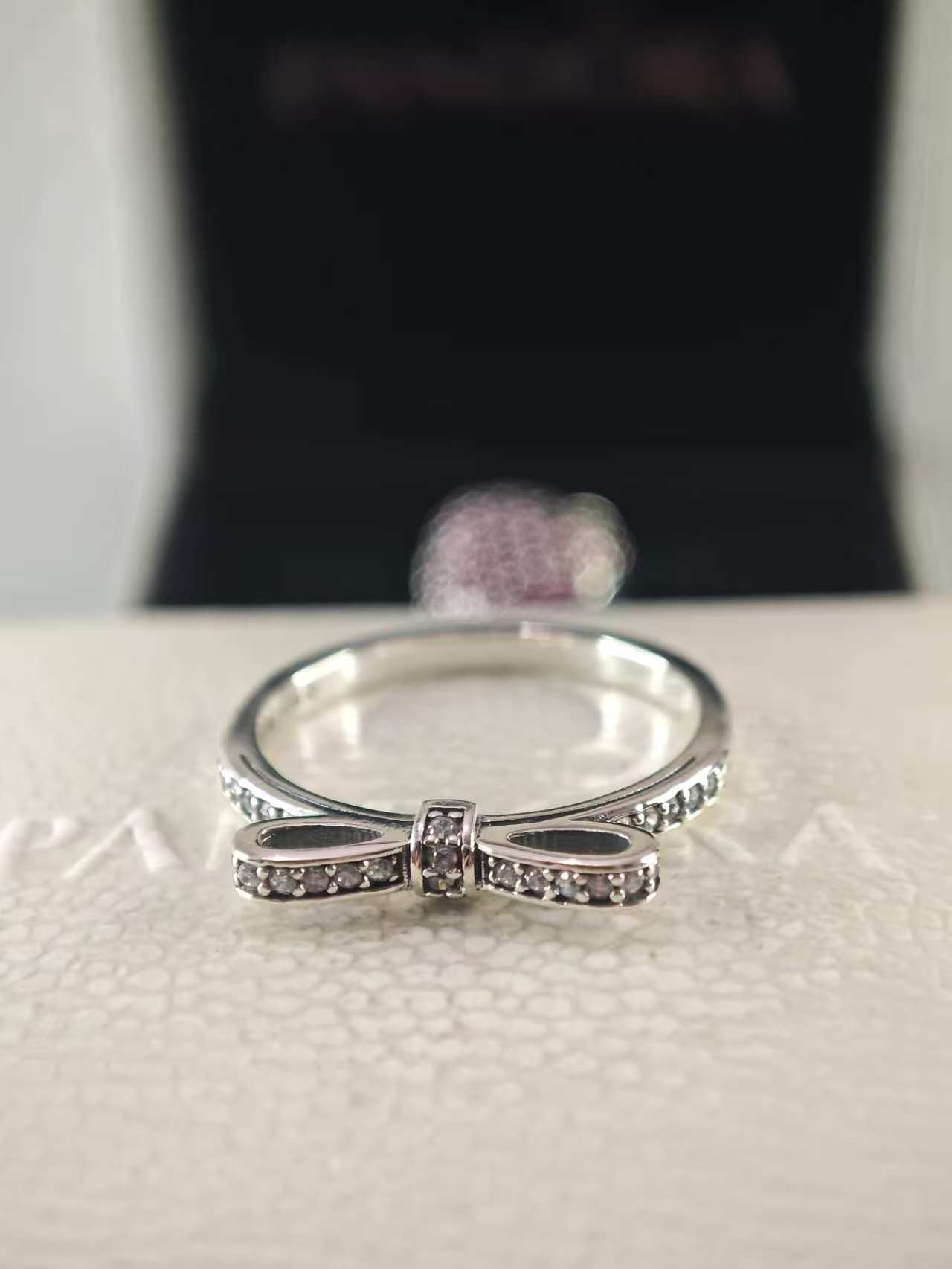 Sterling Silver Sparkling Bow Ring with Clear Zirconia
