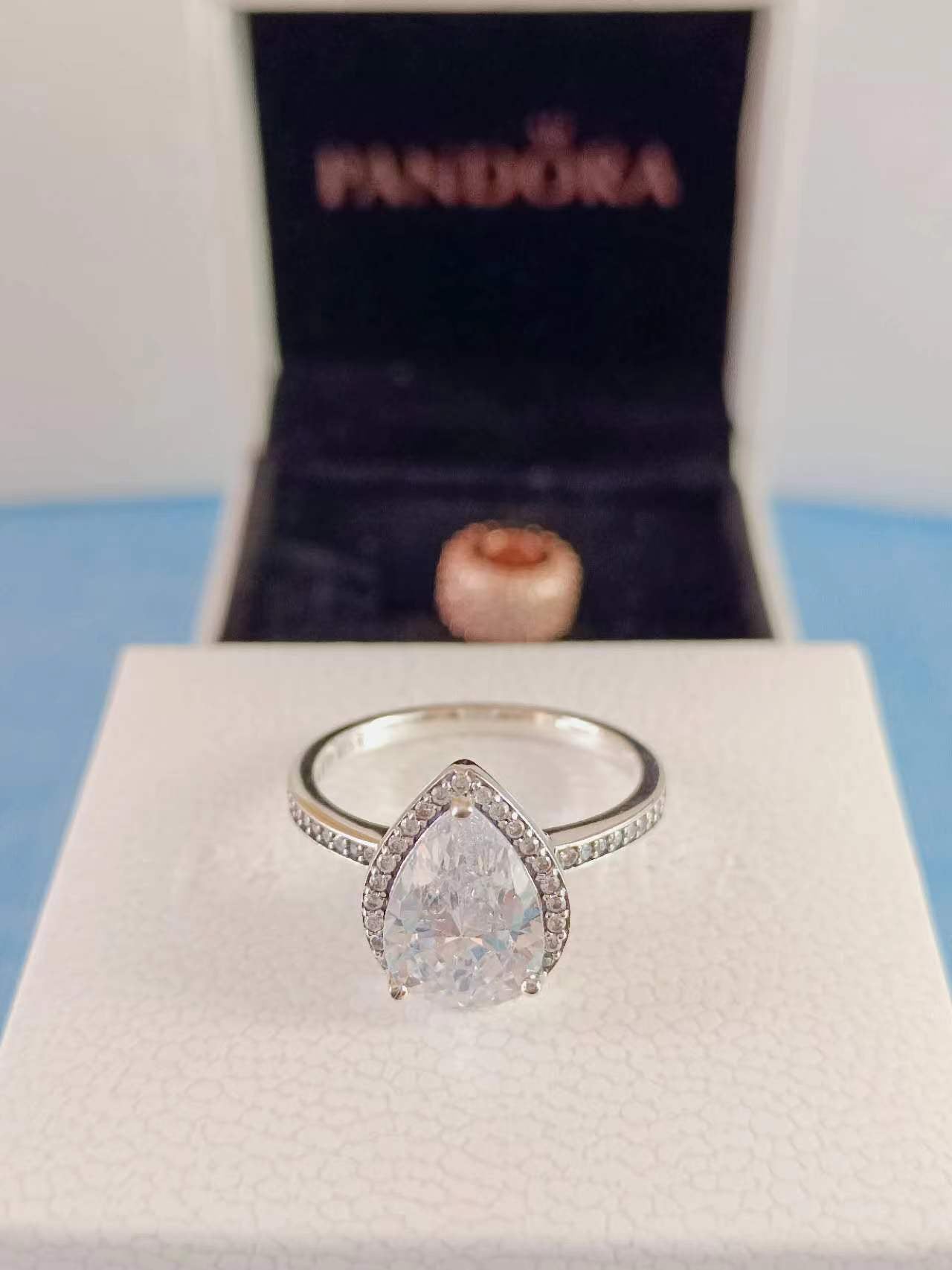 Sparkling Pear Halo Ring Sterling Silver