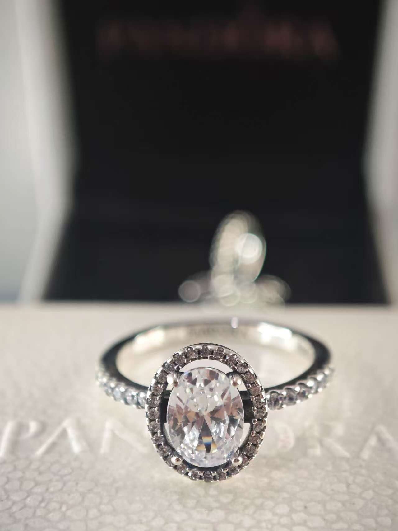 Oval Sparkling Halo Statement Ring