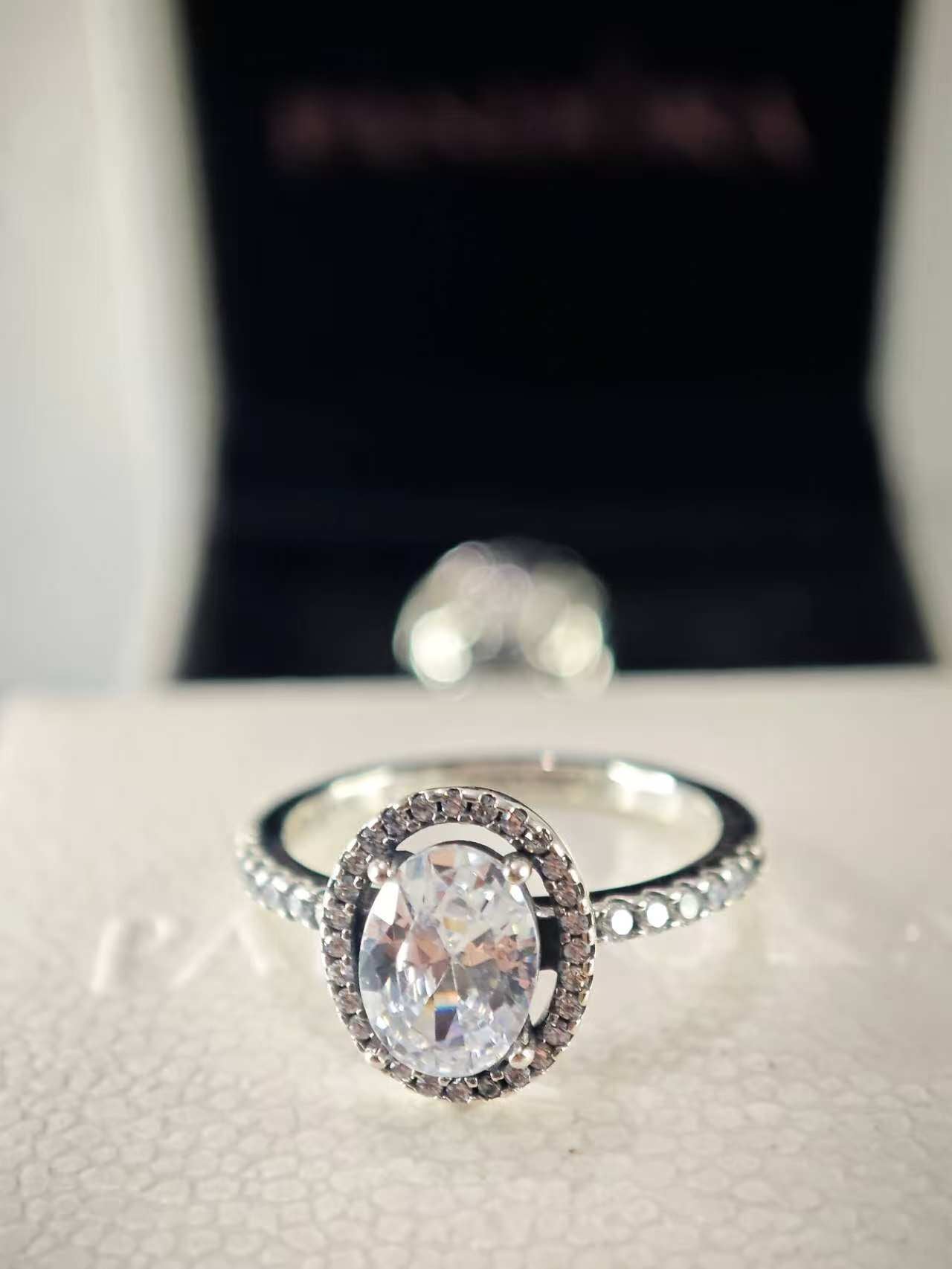 Oval Sparkling Halo Statement Ring