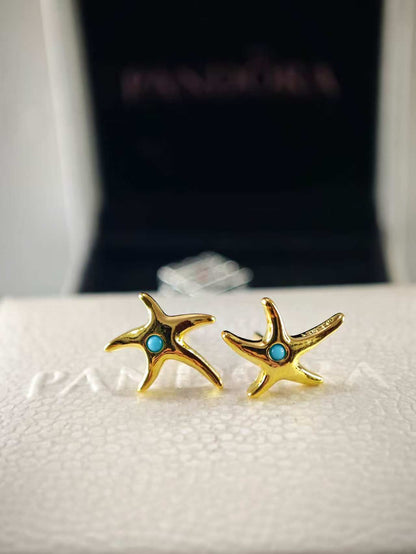 Starfish gold-plated stud earrings with capri blue crystal