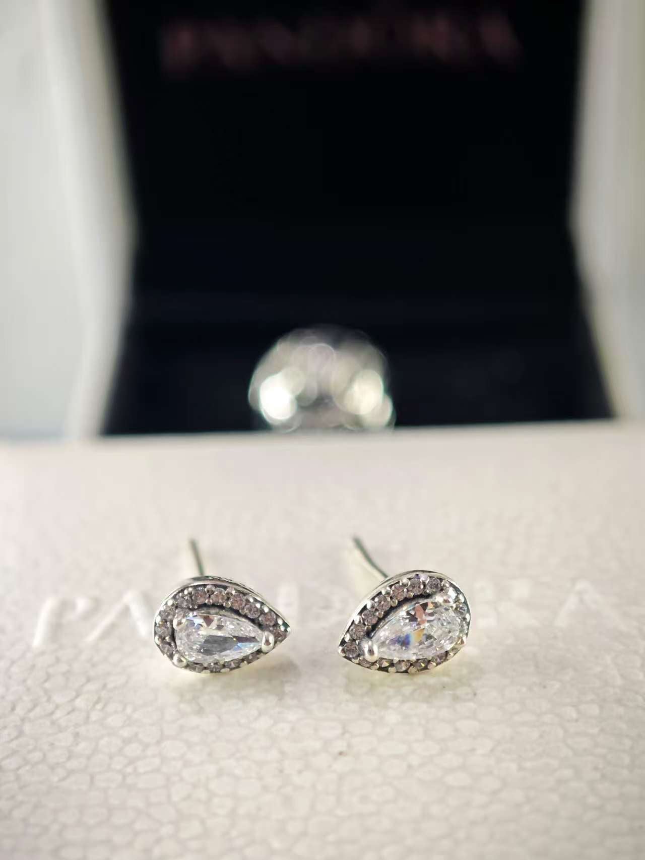 Sparkling Teardrop Halo Stud Earrings