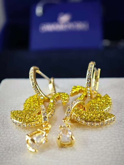 Iconic Swan drop earrings, Swan, Yellow, Gold-tone plated