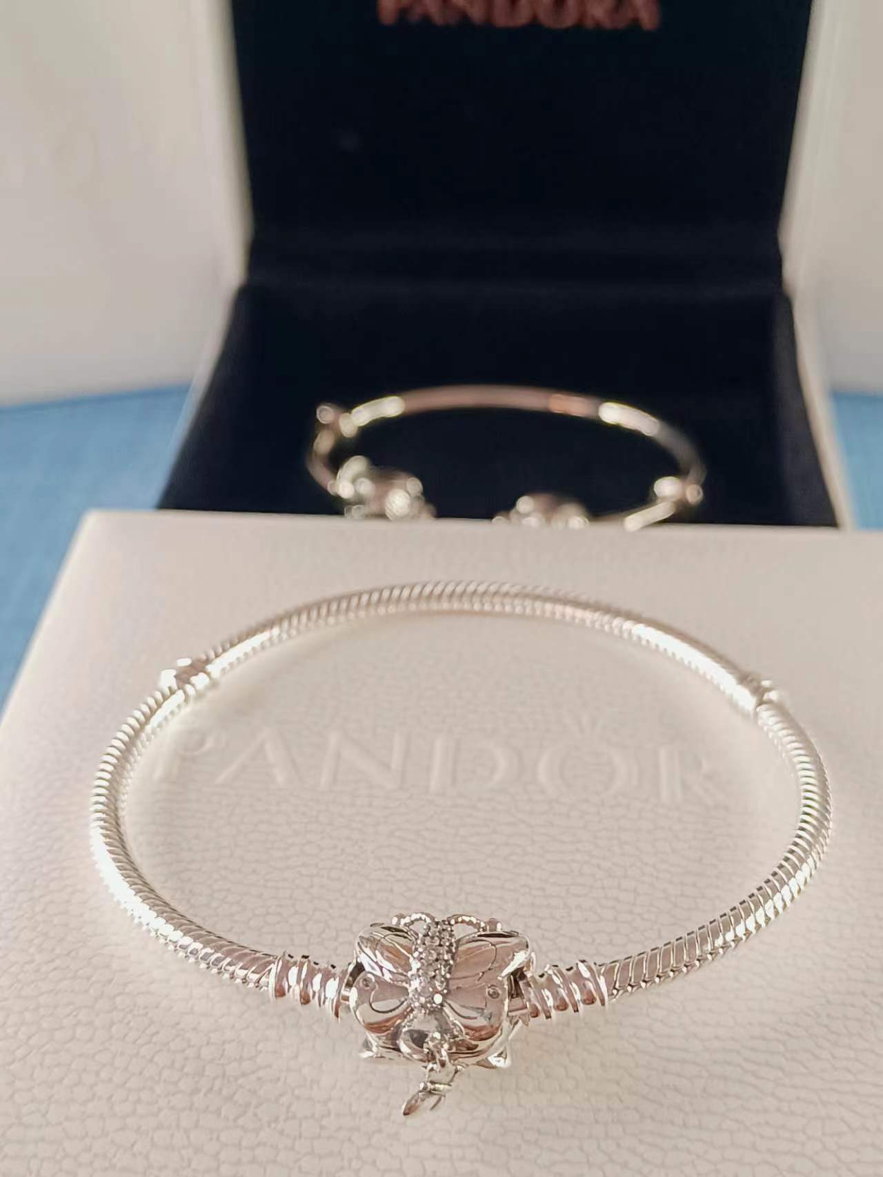 Snake chain silver bracelet and butterfly clasp with clear cubic zirconia
