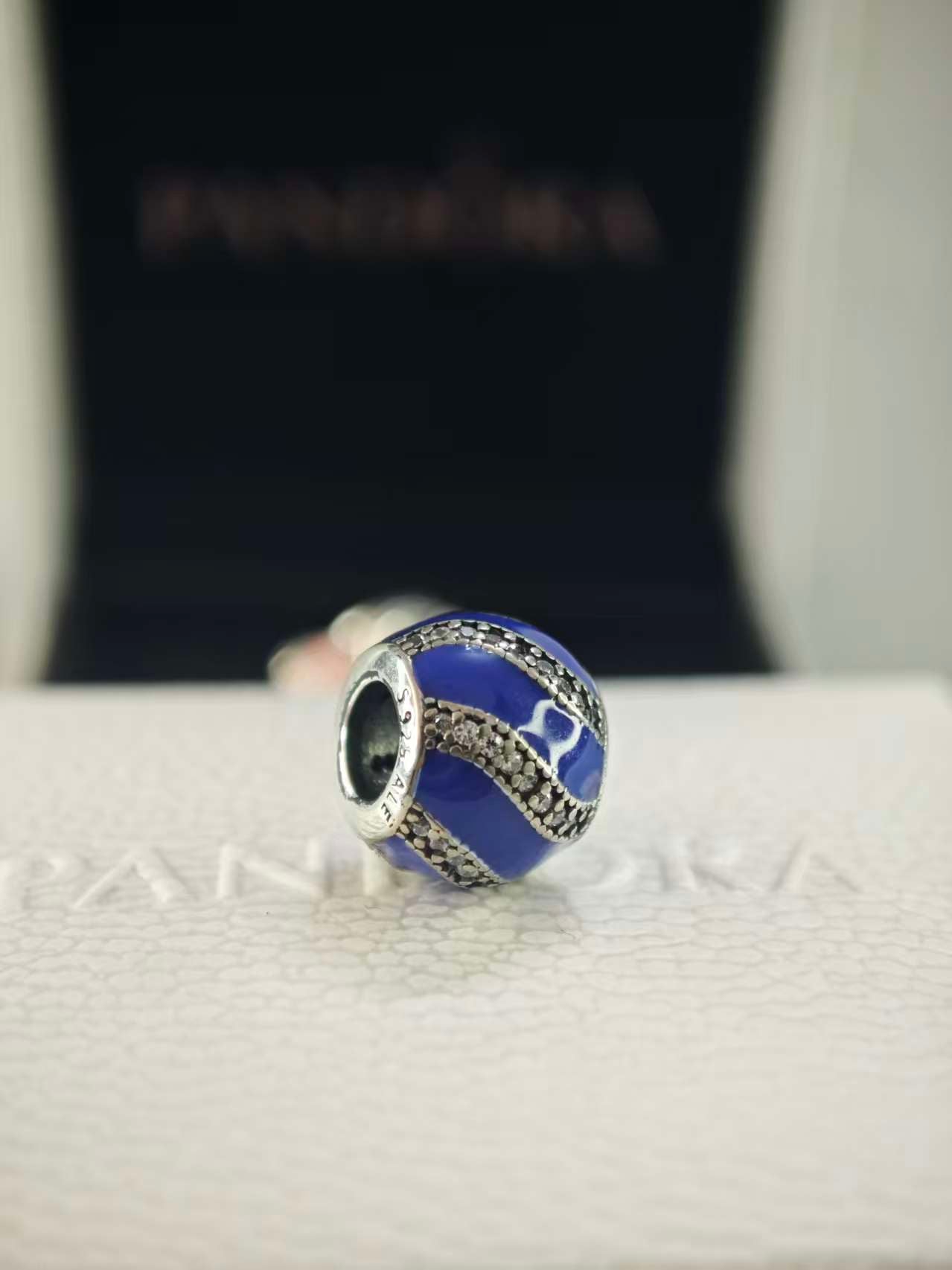 Adornment Charm with Blue Enamel