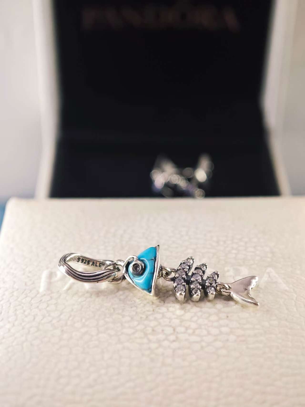 Turquoise-colored Fishbone Dangle Charm