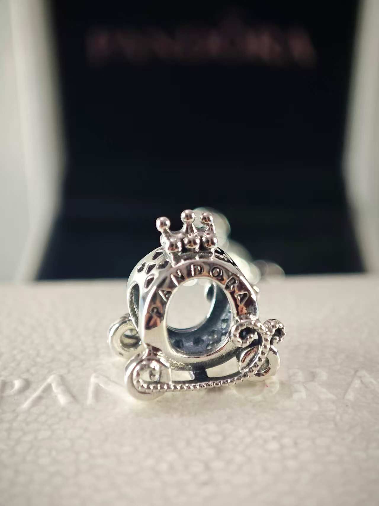 Polished  Crown O Carriage charm