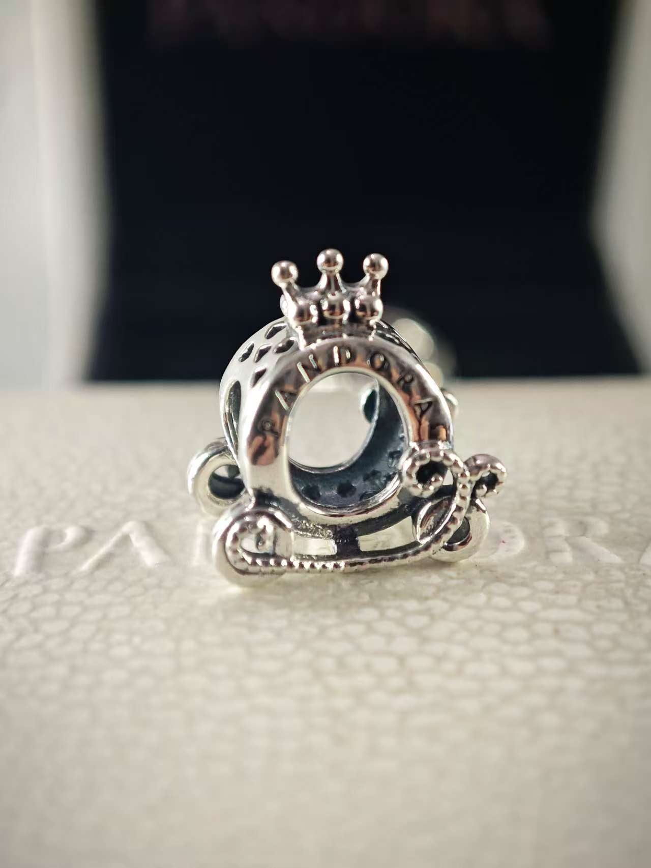 Polished  Crown O Carriage charm