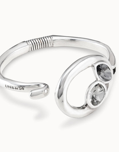 Silver bracelet with silver and greenish gray crystals