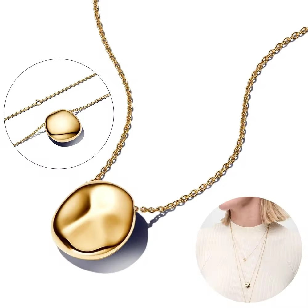 Essence Necklace with round pendant with organic shape