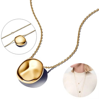 Essence Necklace with round pendant with organic shape